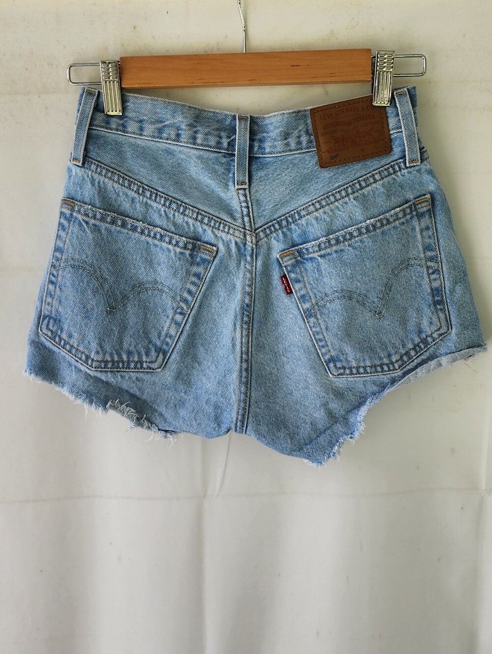 Levi's Premium 501 High-Rise Light Blue Distressed Denim Shorts with Frayed Hem